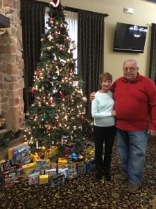 couple under Christmas tree